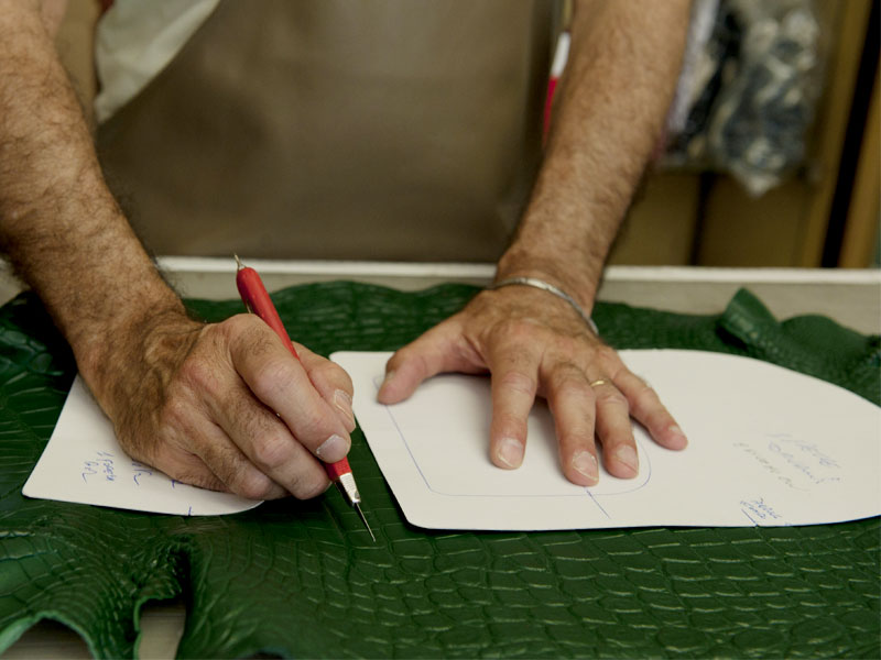 Workspace showcasing the craftsmanship involved in PK1 Milano bespoke leather goods