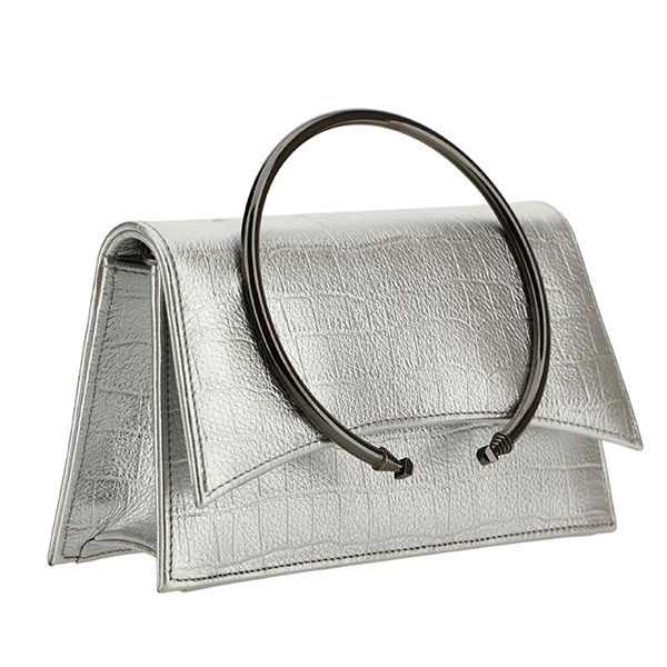 Artisan creating a leather prototype at PK1 Milano