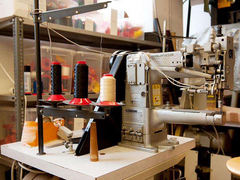 Tools and materials used for bespoke leather goods at PK1 Milano